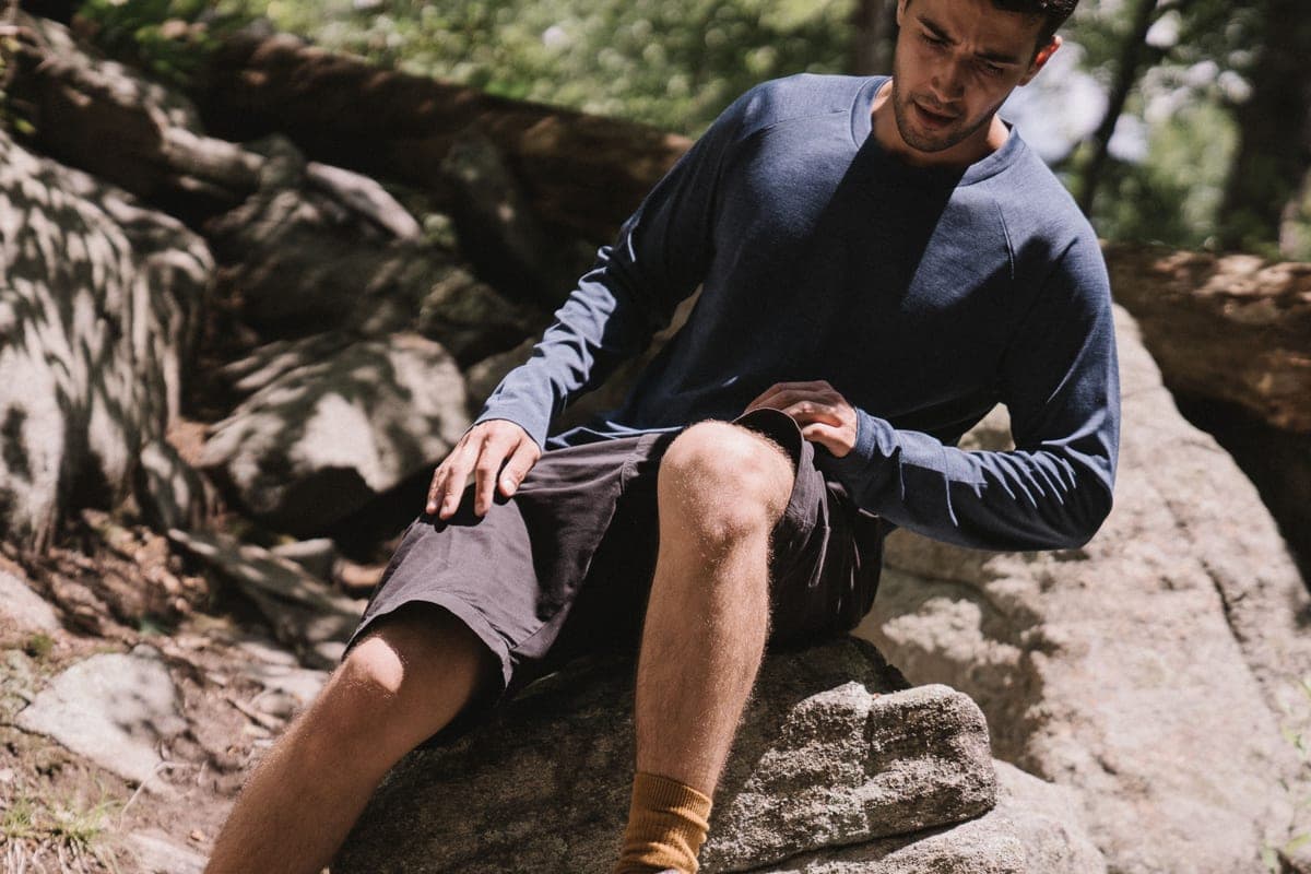Close view of tightly woven technical fabric held against the light